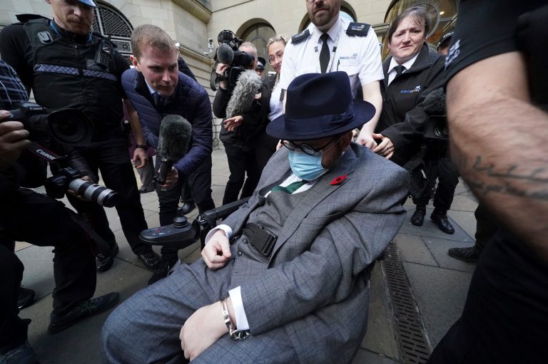 Nicholas Rossi leaves Edinburgh Sheriff And Justice Of The Peace Court in Edinburgh, Friday, Nov. 11, 2022.  A judge in Scotland ruled Friday that a man who has spent almost a year fighting extradition to the United States is Nicholas Rossi, a fugitive alleged to have faked his own death to escape rape allegations.