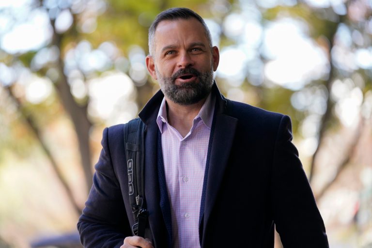 Rep.-elect Cory Mills, R-Fla., arrives for New Member Orientation check-in and program registration at the Hyatt Regency, in Washington, Sunday, Nov. 13, 2022. 