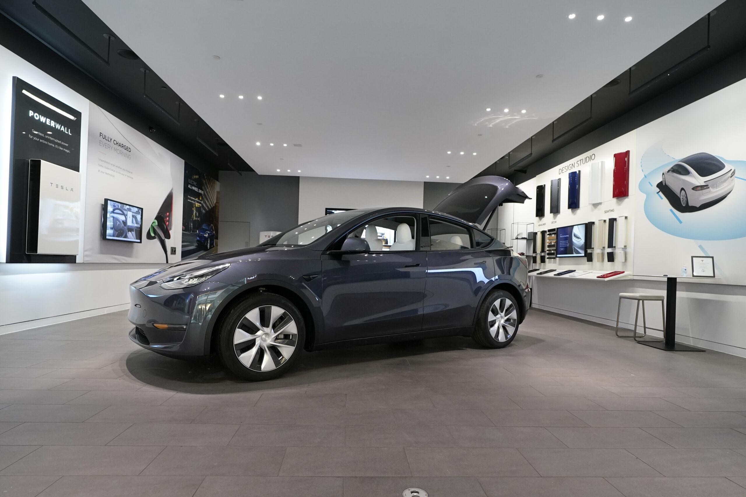 Tesla driver says Model Y told him to pull over before trapping him inside