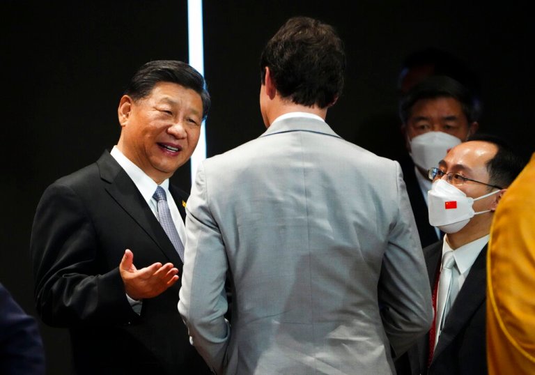 Canada Prime Minister Justin Trudeau talks with Chinese President Xi Jinping after taking part in the closing session at the G20 Leaders Summit in Bali, Indonesia on Wednesday, Nov. 16, 2022.