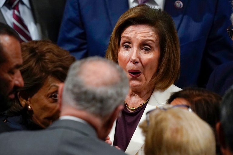 House Speaker Nancy Pelosi of Calif., reacts as she sees Senate Majority Leader Chuck Schumer, D-N.Y., after speaking on the House floor at the Capitol in Washington, Thursday, Nov. 17, 2022.