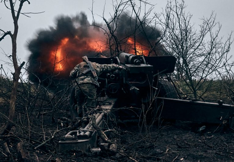 Ukrainian soldiers fire artillery at Russian positions near Bakhmut, Donetsk region, Ukraine, Sunday, Nov. 20, 2022. 