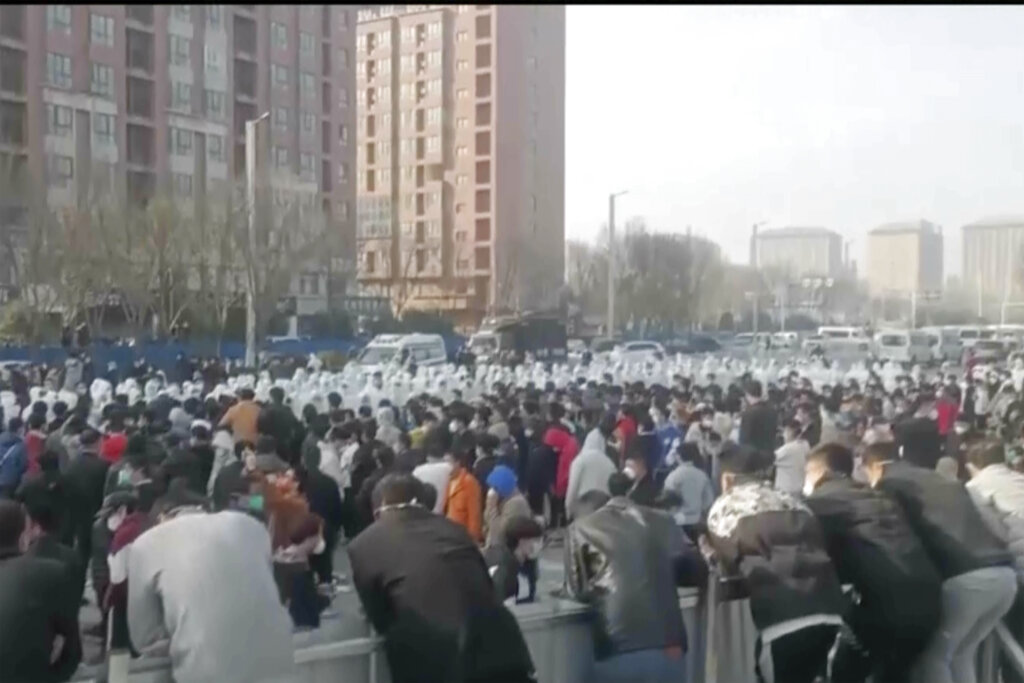 Protests erupt at iPhone plant in China over unpaid wages and COVID-19 exposure