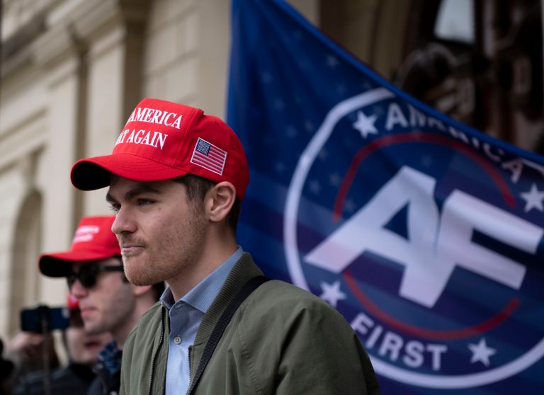 FILE - Nick Fuentes, far-right activist, holds a rally at the Lansing Capitol, in Lansing, Mich., Nov. 11, 2020. (Nicole Hester/Ann Arbor News via AP, File)
