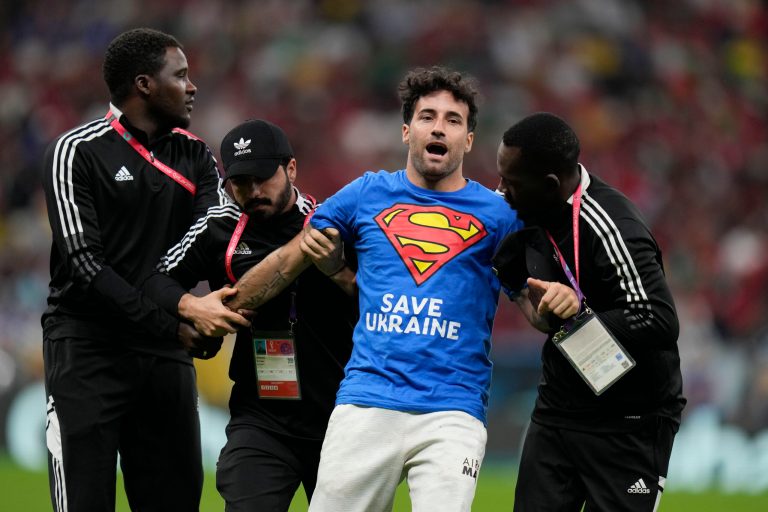 World Cup 2022: Watch as protester runs across field with gay pride flag, Save Ukraine T-shirt
