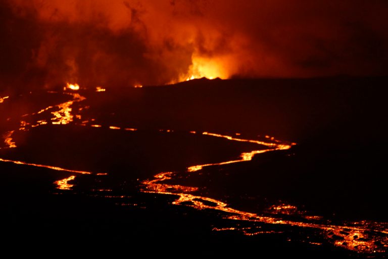 Lava erupts from Hawaii's Mauna Loa volcano, Tuesday, Nov. 29, 2022, near Hilo, Hawaii.