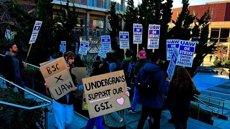 Graduate student instructors and researchers picket at University of California, Berkeley, during the fourth week of a strike by academic workers at the 10-campus UC system in Berkeley, California, Wednesday, Dec. 7, 2022. A month into the nation's largest strike involving higher education, classes are being canceled, and important research is being disrupted at the 10 campuses of the University of California.