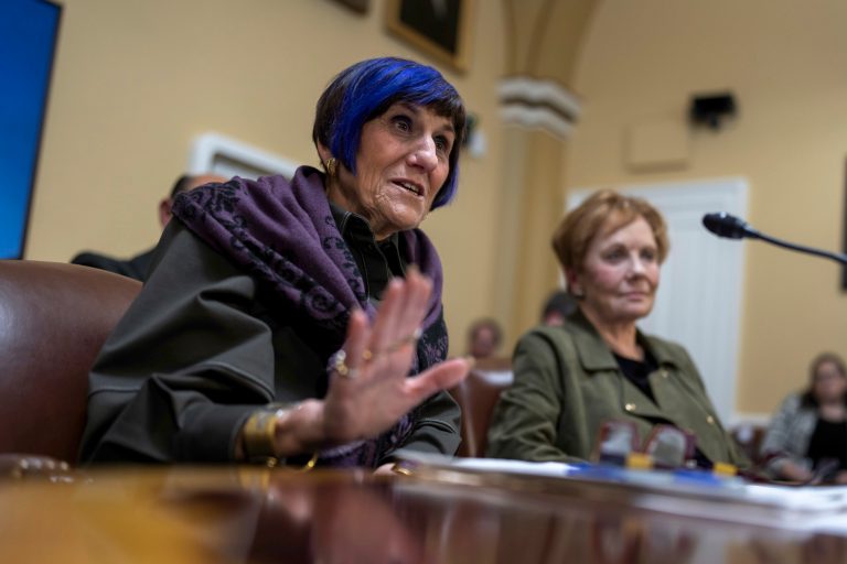 Rep. Rosa DeLauro (D-CT), left, goes before the House Rules Committee to prepare the $1.7 trillion government funding bill for a final vote after it passed in the Senate, at the Capitol in Washington, Thursday, Dec. 22, 2022. 