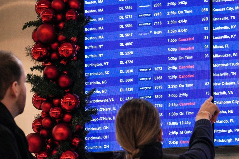 Canceled and delayed flights near 30,000 amid rare bomb cyclone