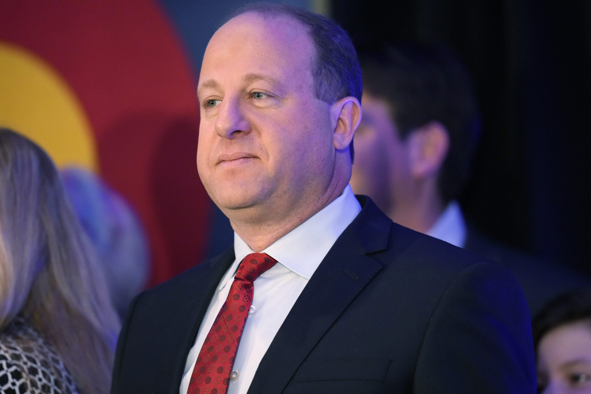 Polis announces $252 million in spending cuts to close Colorado budget deficit