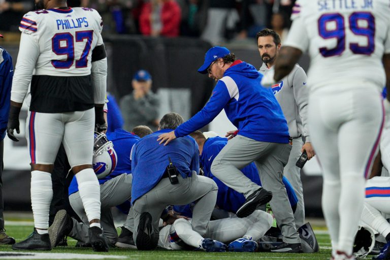 Buffalo Bills' Damar Hamlin is examined during the first half of an NFL football game against the Cincinnati Bengals, Monday, Jan. 2, 2023, in Cincinnati. 