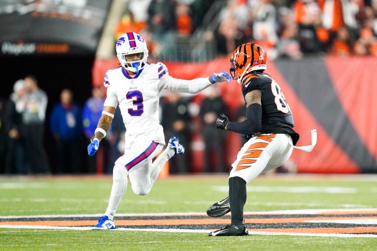 Buffalo Bills safety Damar Hamlin (3) prepares to tackle Cincinnati Bengals wide receiver Tee Higgins (85) during the first half of an NFL football game, Monday, Jan. 2, 2023, in Cincinnati. Hamlin was injured on the play. 