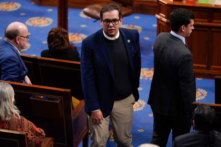 Rep.-elect George Santos, R-N.Y., walks in the House chamber as the House meets for the third day to elect a speaker and convene the 118th Congress in Washington, Thursday, Jan. 5, 2023. Santos has been under harsh criticism for claims he's made that turned out to be false.