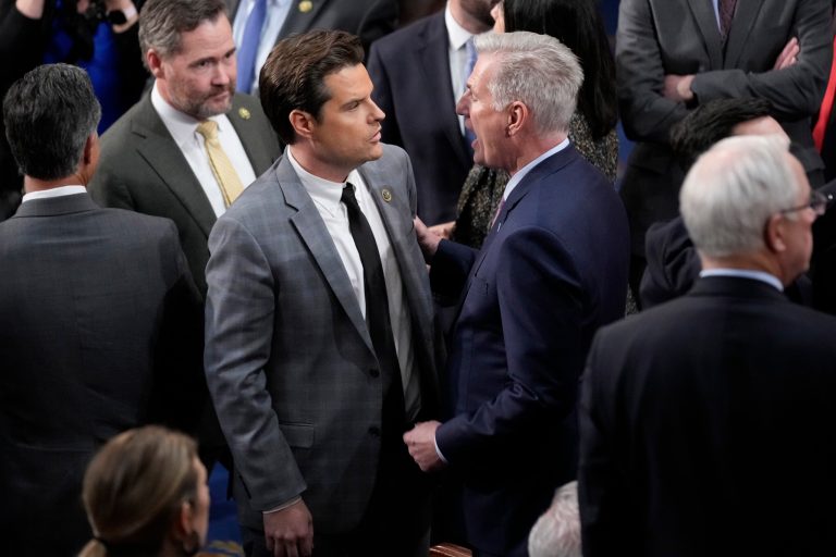 Rep. Kevin McCarthy (R-CA) talks with Rep. Matt Gaetz (R-FL) during voting on a motion to adjourn after the 14th vote for speaker, Friday, Jan. 6, 2023.