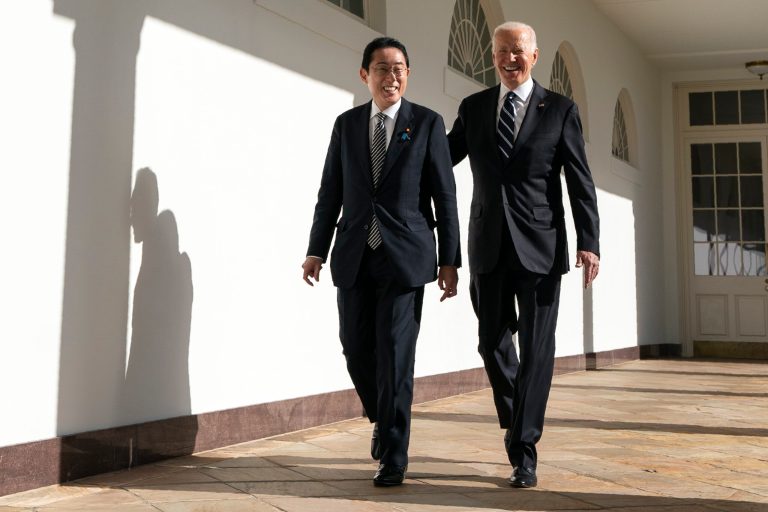 President Joe Biden walks with Japanese Prime Minister Fumio Kishida to a meeting in the Oval Office of the White House, Friday, Jan. 13, 2023, in Washington.