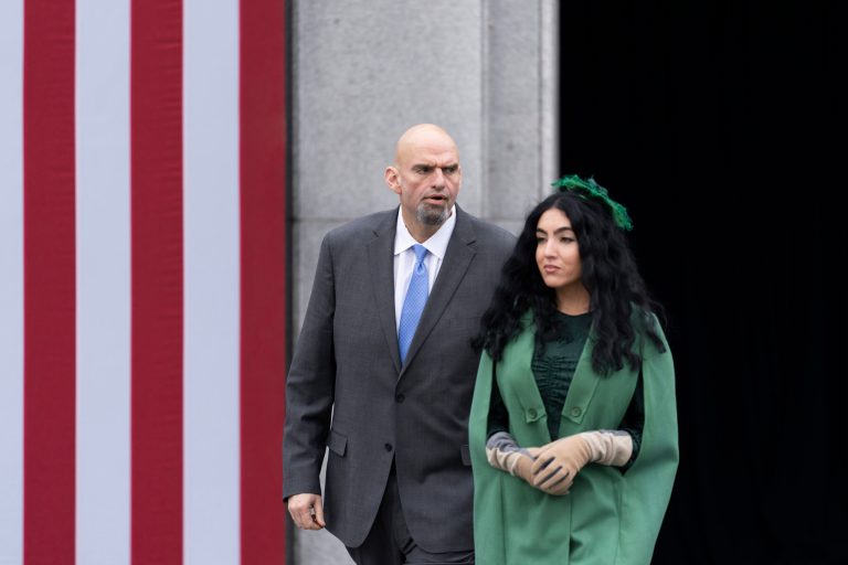 Sen. John Fetterman, D-Pa., left, with his wife Gisele Barreto Fetterman, arrive for Democratic Gov. Josh Shapiro's Inauguration, Tuesday, Jan. 17, 2023, at the state Capitol in Harrisburg, Pa.
