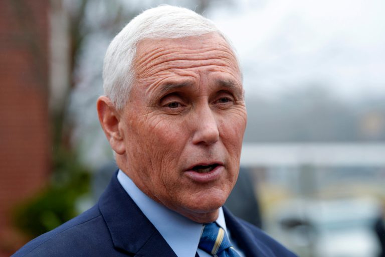 FILE - Former Vice President Mike Pence speaks with reporters, Dec. 6, 2022, at Garden Sanctuary Church of God in Rock Hill, S.C. 