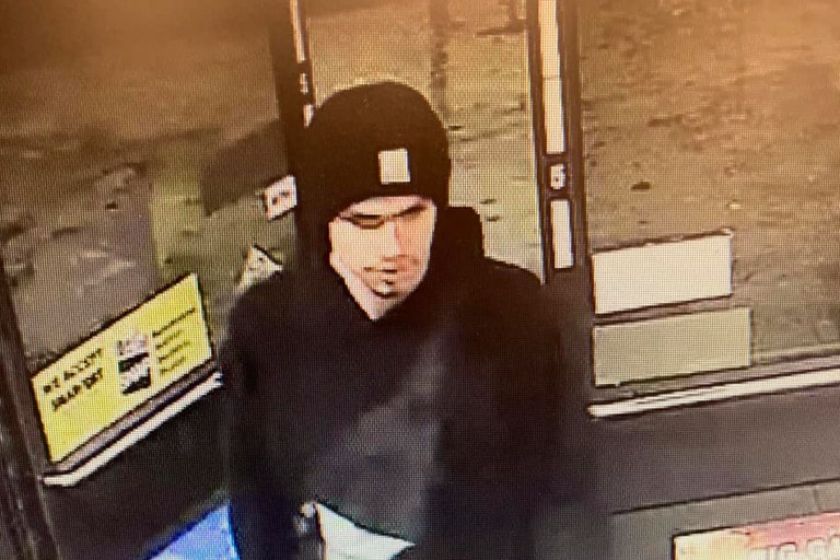 This surveillance video image released by the Yakima Police Department shows a suspect sought in a shooting at a convenience store in Yakima, Wash., early on Tuesday, Jan. 24, 2023. At least three people were killed in a random shooting Tuesday, in Yakima, and police are still searching for the suspect. (Yakima Police Department via AP).