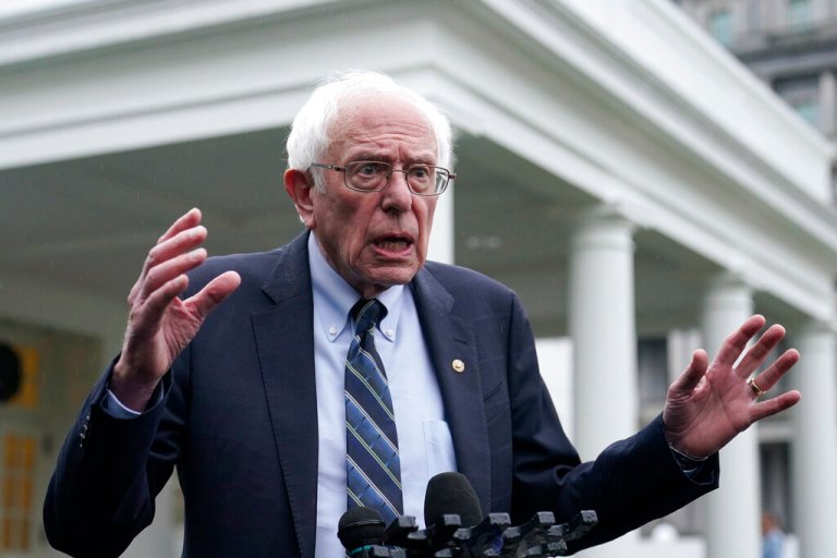 Sen. Bernie Sanders, I-Vt., talks with reporters outside the West Wing of the White House in Washington, Wednesday, Jan. 25, 2023.
