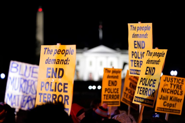 Protesters gather in Lafayette Park outside the White House in Washington, Friday, Jan. 27, 2023, over the death of Tyre Nichols, who died after being beaten by Memphis police.