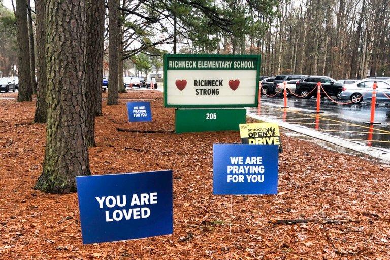 Signs stand outside Richneck Elementary School in Newport News, Virginia.