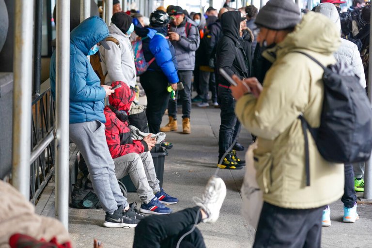 Migrants outside a New York City hotel.