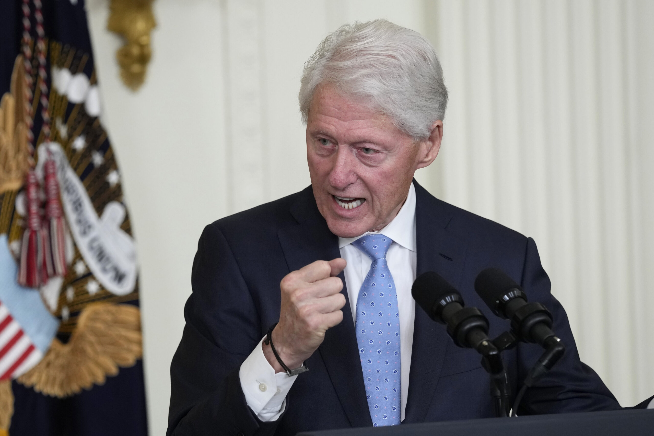 Bill Clinton pushes paid family leave in White House appearance