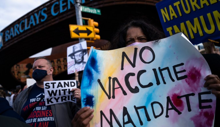 Biden administration scraps vaccine mandates for travel and federal employees