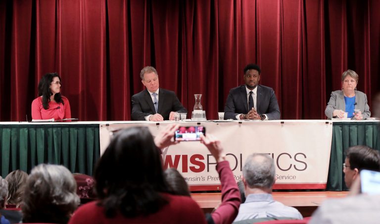 From left, Wisconsin state Supreme Court candidates Waukesha County Judge Jennifer Dorow, former Wisconsin Supreme Court Justice Dan Kelly, Dane County Judge Everett Mitchell, and Milwaukee County Judge Janet Protasiewicz participate in a forum at Monona Terrace in Madison, Wis., Jan. 9, 2023. 