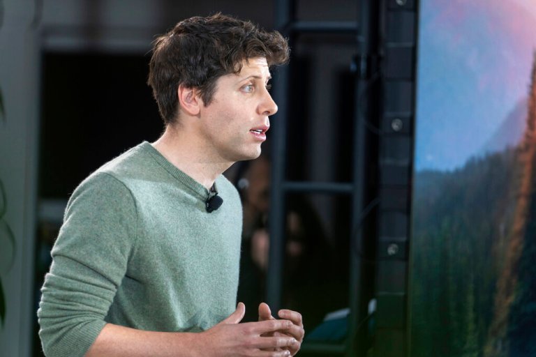 OpenAI CEO Sam Altman speaks to members of the media during the Introduction of the integration of the Microsoft Bing search engine and Edge browser with OpenAI on Tuesday, Feb. 7, 2023, in Redmond. Microsoft is fusing ChatGPT-like technology into its search engine Bing, transforming an internet service that now trails far behind Google into a new way of communicating with artificial intelligence. 