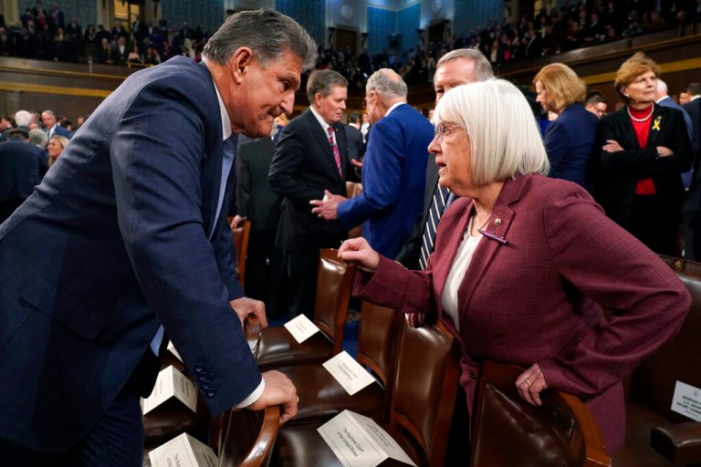 Sen. Joe Manchin (D-WV) talks with Sen. Patty Murray (D-WA) before President Joe Biden delivers the State of the Union address to a joint session of Congress at the Capitol, Tuesday, Feb. 7, 2023, in Washington.