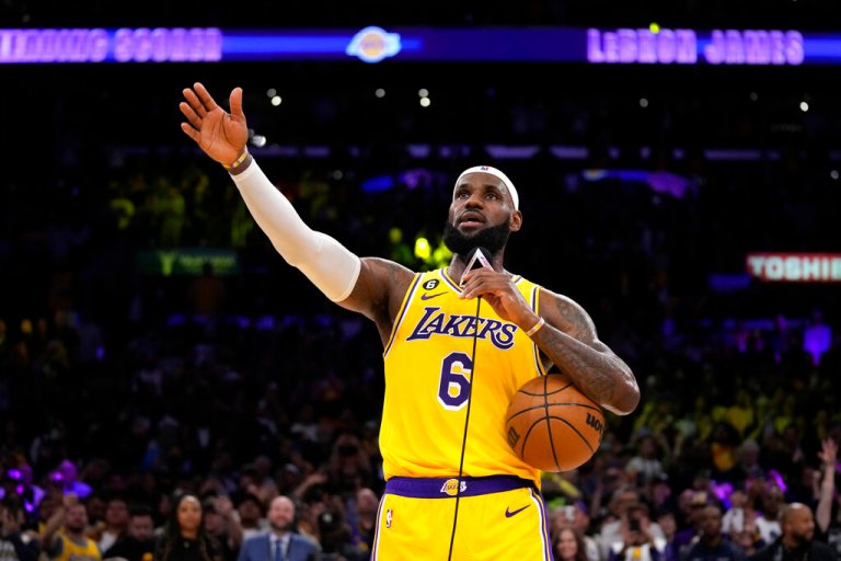 Los Angeles Lakers forward LeBron James speaks to fans after passing Kareem Abdul-Jabbar to become the NBA's all-time leading scorer during the second half of an NBA basketball game against the Oklahoma City Thunder Tuesday, Feb. 7, 2023, in Los Angeles.