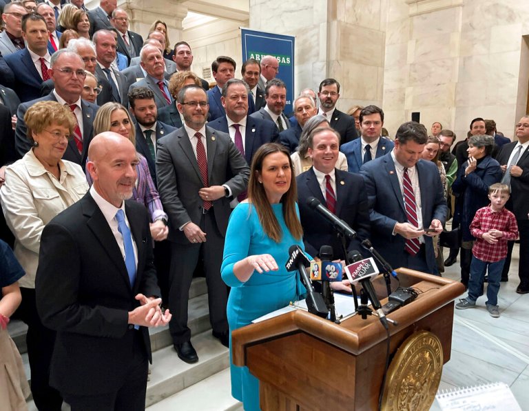 Arkansas Gov. Sarah Huckabee Sanders answers reporters' questions at a news conference at the state Capitol in Little Rock, Ark., Wednesday, Feb. 8, 2023, about an education reform bill she's proposing. 