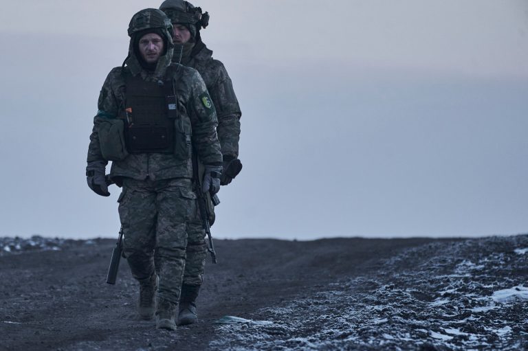 Ukrainian soldiers go to their position in the frontline close to Bakhmut, Donetsk region, Ukraine, Thursday, Feb. 9, 2023.
