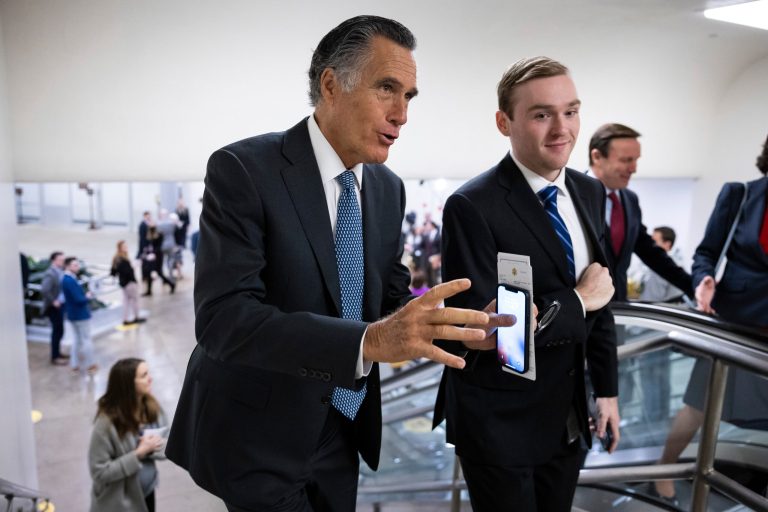 Sen. Mitt Romney (R-Utah) walks to a vote at the U.S. Capitol Feb. 9, 2023.