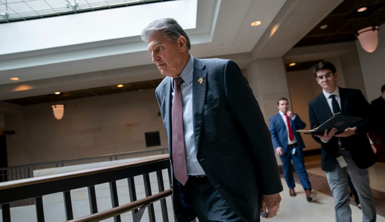 Sen. Joe Manchin arrives for a classified briefing on China, at the Capitol in Washington, Wednesday, Feb. 15, 2023. 