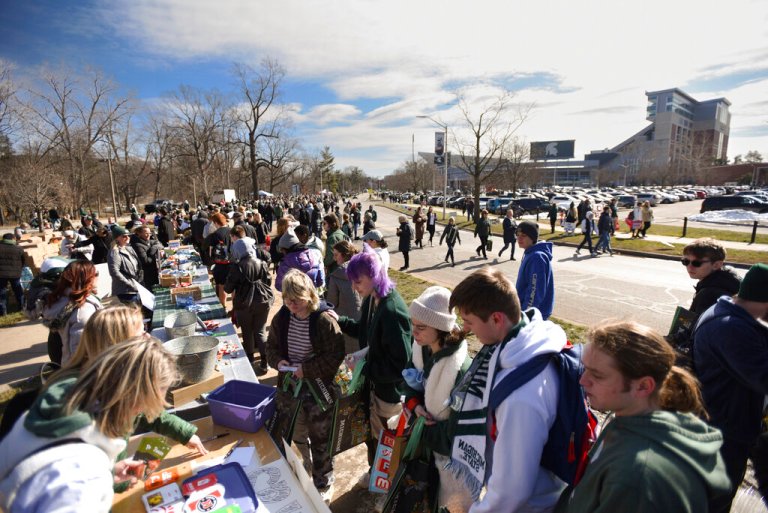 Michigan State University shooting: Students return one week after campus rampage that killed three and injured five