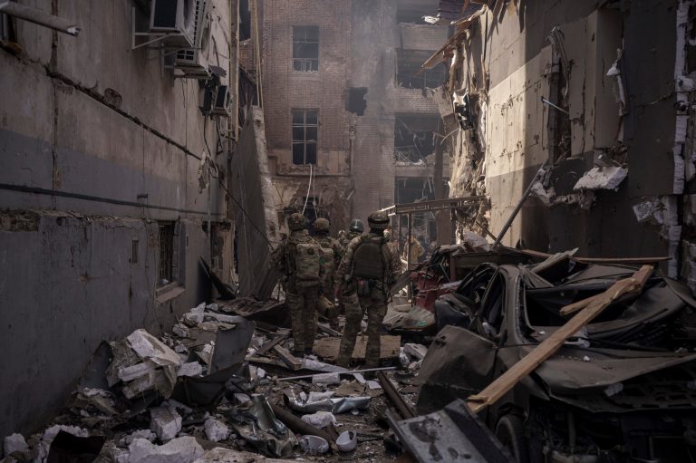 US aid to Ukraine tops $112 billion in first year as Biden promises more to come
