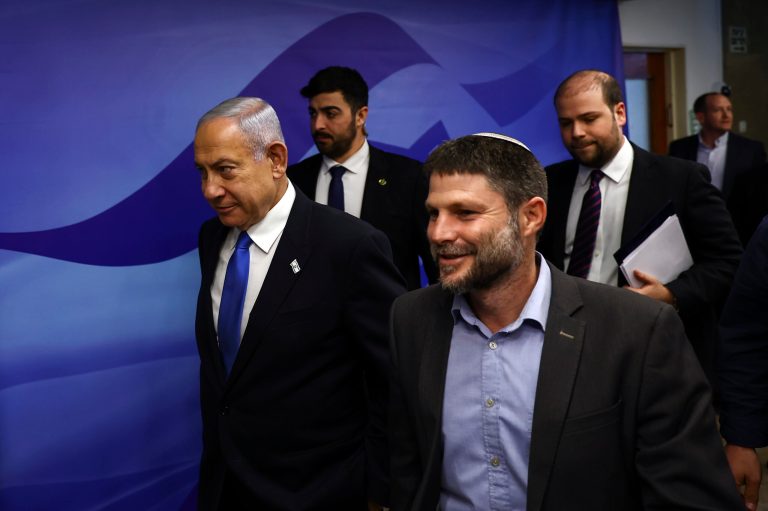 Israeli Prime Minister Benjamin Netanyahu and Finance Minister Bezalel Smotrich arrive to attend a Cabinet meeting at the prime minister's office in Jerusalem, Thursday, Feb. 23, 2023. 