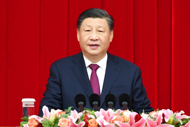 In this photo released by Xinhua News Agency, Chinese President Xi Jinping speaks during the New Year gathering organized by the National Committee of the Chinese People's Political Consultative Conference (CPPCC) in Beijing on Dec. 30, 2022.