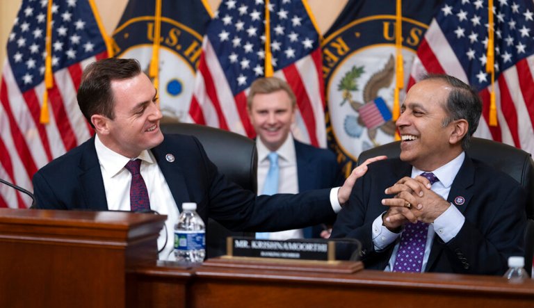 Chairman Mike Gallagher, left, working with Rep. Raja Krishnamoorthi.