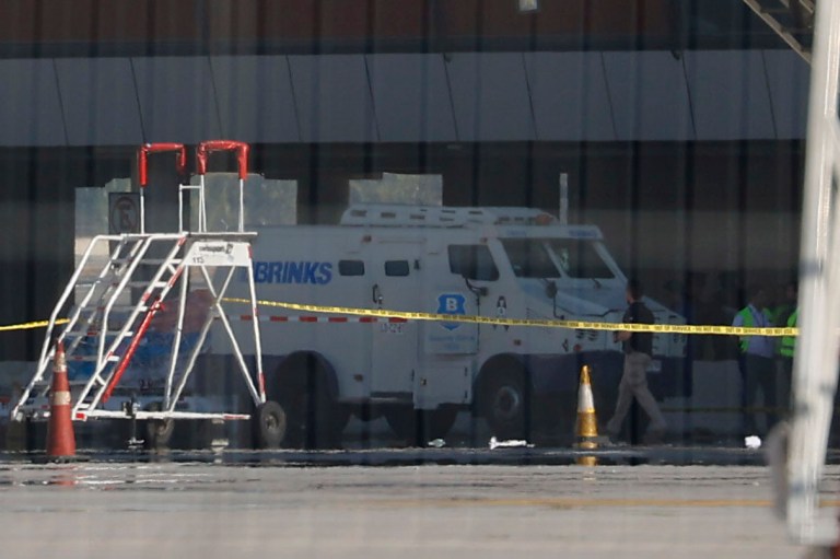 Airport shootout kills two amid attempted heist of over $32 million aboard plane from Florida