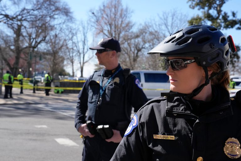 U.S. Capitol Police officers block the way for demonstrators during the protest in front of the Dirksen Senate Office Building, Wednesday, March 8, 2023, on Capitol Hill in Washington. (AP Photo/Mariam Zuhaib)