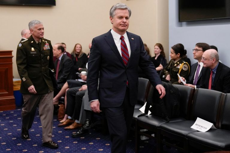 FBI Director Christopher Wray, followed by Commander, U.S. Cyber Command and Director, National Security Agency/Chief, Central Security Service Gen. Paul Nakasone arrives for the House Select Committee on Intelligence annual open hearing.