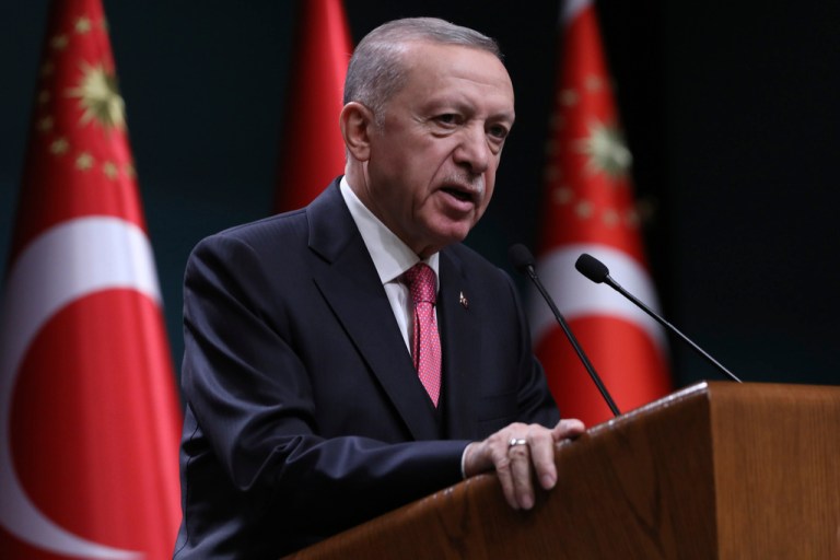 Turkey's President Recep Tayyip Erdogan speaks after he signed a decision confirming the election date, in Ankara, Turkey, Friday, March 10, 2023.