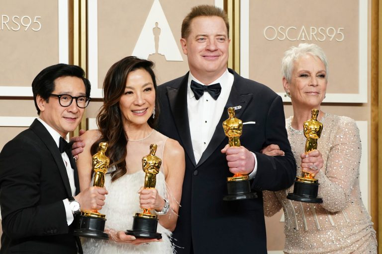 Ke Huy Quan, from left, Michelle Yeoh, Brendan Fraser and Jamie Lee Curtis pose with their awards in the press room at the Oscars on Sunday, March 12, 2023, at the Dolby Theatre in Los Angeles. 
