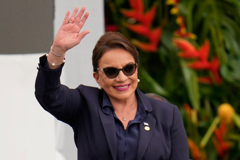 Honduras's President Xiomara Castro waves during the swearing-in ceremony for Colombia's President Gustavo Petro in Bogota, Colombia, Sunday, Aug. 7, 2022. 