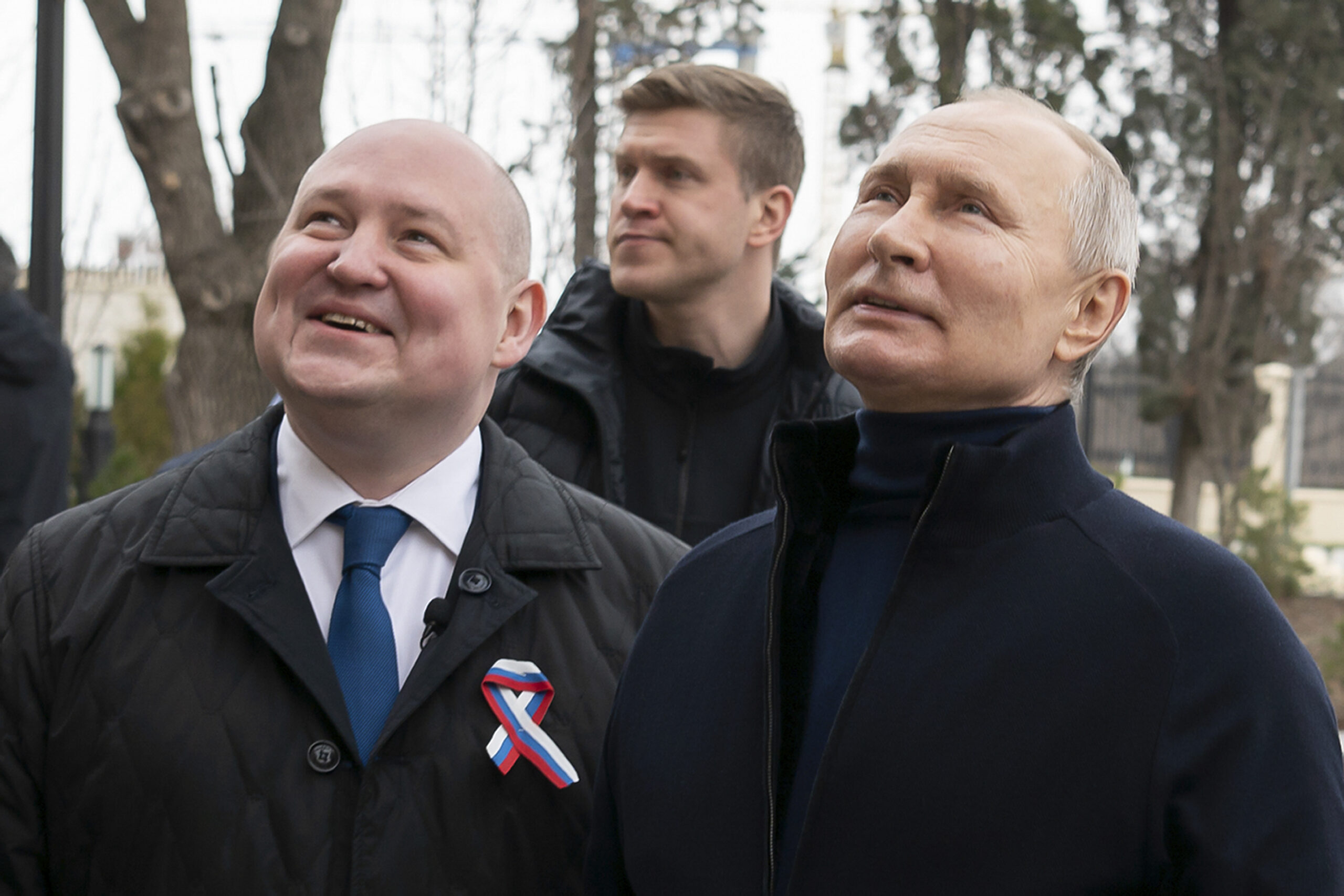 Putin makes unexpected trip to Crimea on annexation anniversary
