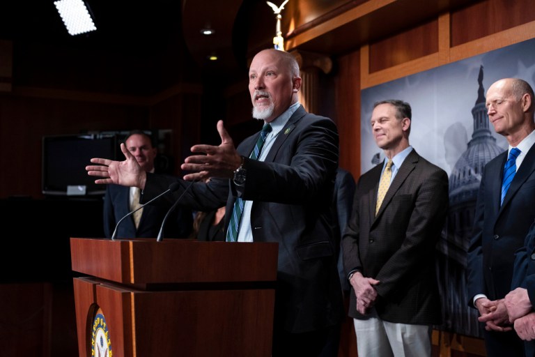 Rep. Chip Roy (R-TX) joined from left by Sen. Mike Lee (R-UT), Rep. Scott Perry (R-PA), and Sen. Rick Scott (R-FL), as the conservative House Freedom Caucus and Republican senators hold a news conference on the debt limit at the Capitol in Washington, Wednesday, March 22, 2023.