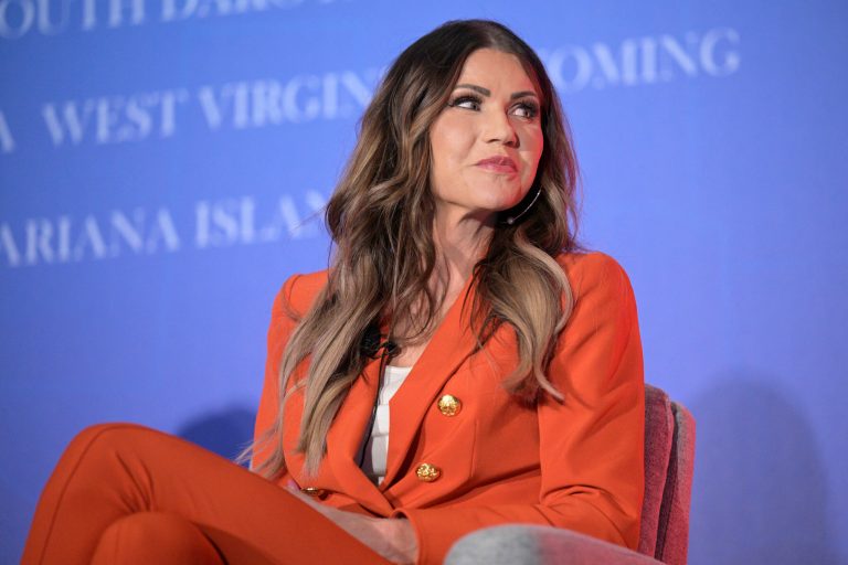 South Dakota Gov. Kristi Noem takes part in a panel discussion during a Republican Governors Association conference, Nov. 15, 2022, in Orlando, Florida. 